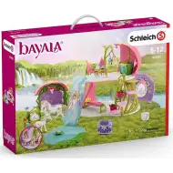 Schleich: Bayala - Sijoča cvetlična hiša z enorogi, hlevom in jezerom igralni set (42455)