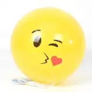 Rumena emoji gumijasta žoga premera 23cm